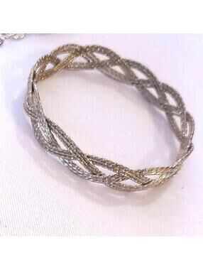 Silver tone braided bangle bracelet
